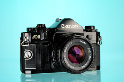Canon A-1 35mm SLR Film Camera + 50mm f/1.8 nFD Lens