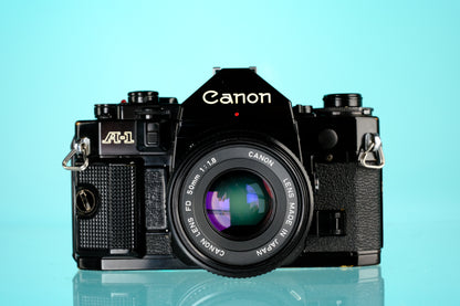 Canon A-1 35mm SLR Film Camera + 50mm f/1.8 nFD Lens