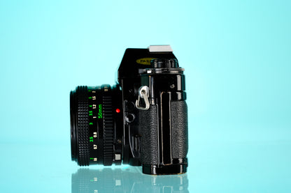 Canon A-1 35mm SLR Film Camera + 50mm f/1.8 nFD Lens