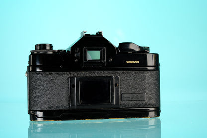 Canon A-1 35mm SLR Film Camera + 50mm f/1.8 nFD Lens