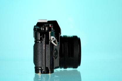 Canon A-1 35mm SLR Film Camera + 50mm f/1.8 nFD Lens