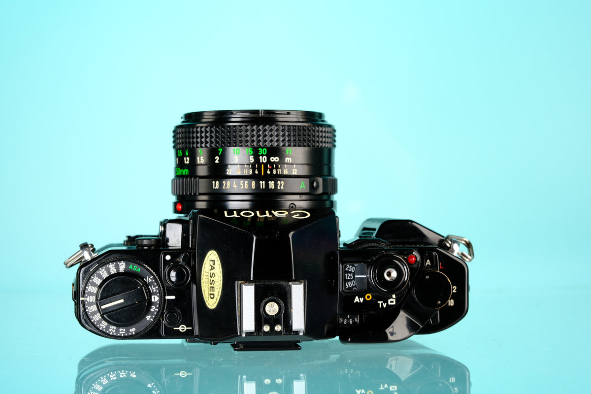 Canon A-1 35mm SLR Film Camera + 50mm f/1.8 nFD Lens