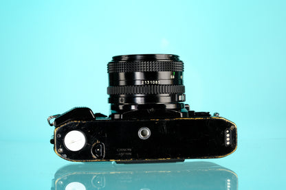 Canon A-1 35mm SLR Film Camera + 50mm f/1.8 nFD Lens