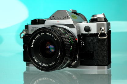 Canon AE-1 Program 35mm SLR + 28mm f/2.8 nFD Wide Angle Lens
