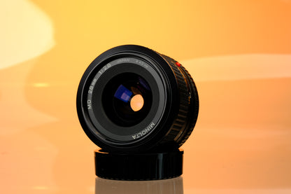 Minolta 28mm f/2.8 Lens + Hood