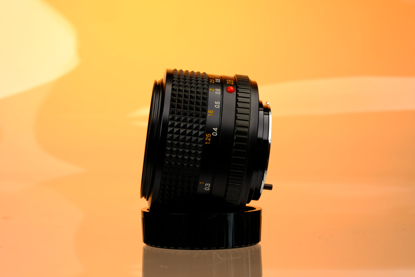 Minolta 28mm f/2.8 Lens + Hood