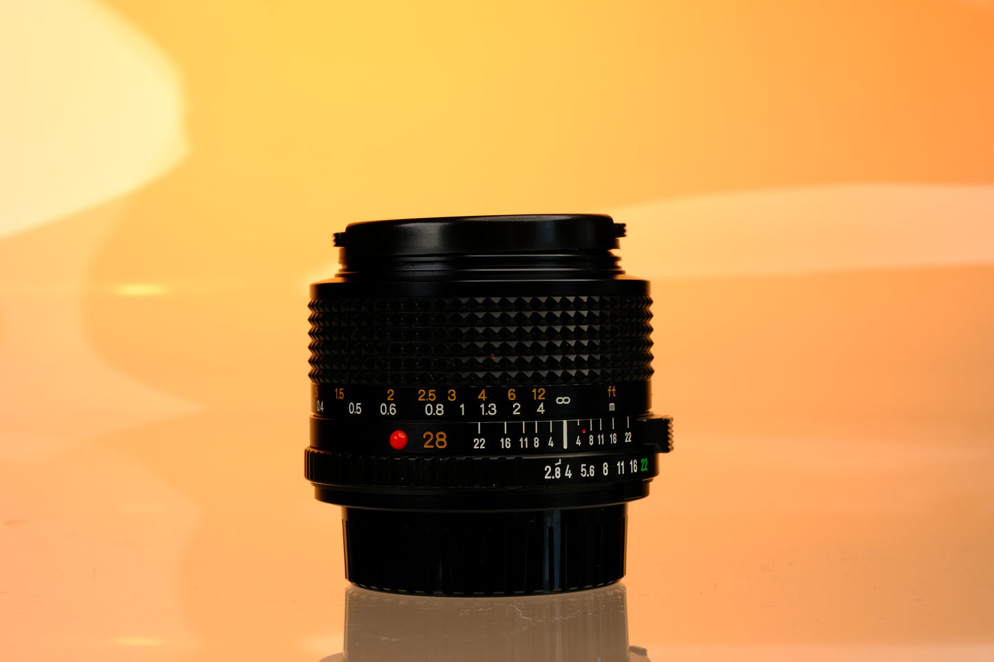 Minolta 28mm f/2.8 Lens + Hood