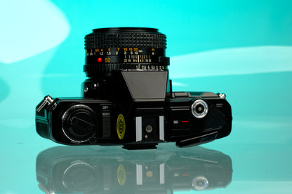 Minolta X-7a 35mm SLR + 50mm f/1.7 Lens