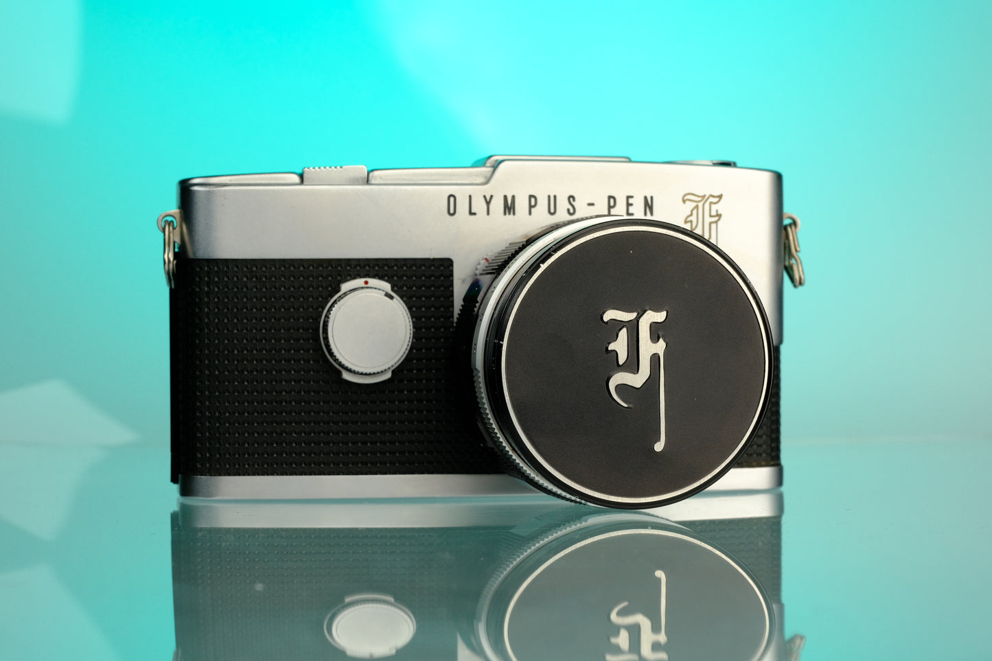 Olympus PEN-F 35mm Half Frame Film Camera + 42mm f/1.2 Lens