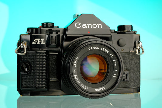 Canon A-1 35mm SLR Film Camera + 50mm f/1.8 Refurbished Lens
