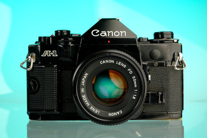 Canon A-1 35mm SLR Film Camera + 50mm f/1.8 Refurbished Lens