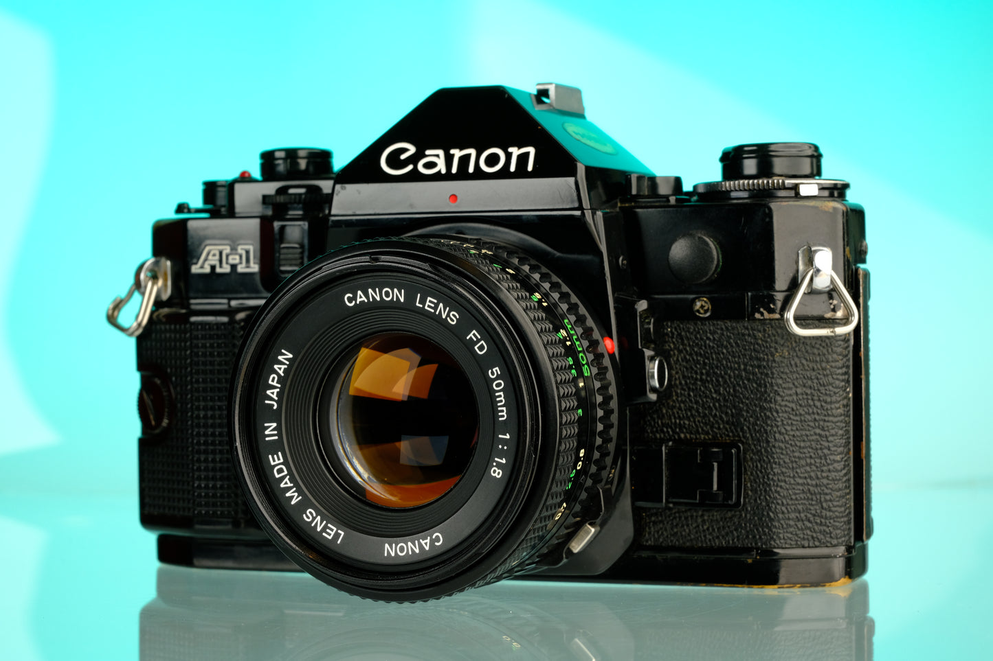 Canon A-1 35mm SLR Film Camera + 50mm f/1.8 Refurbished Lens