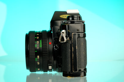 Canon A-1 35mm SLR Film Camera + 50mm f/1.8 Refurbished Lens