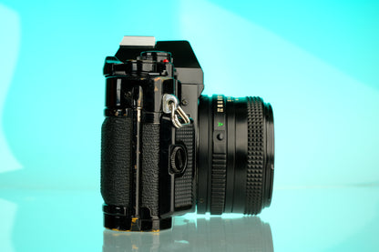 Canon A-1 35mm SLR Film Camera + 50mm f/1.8 Refurbished Lens