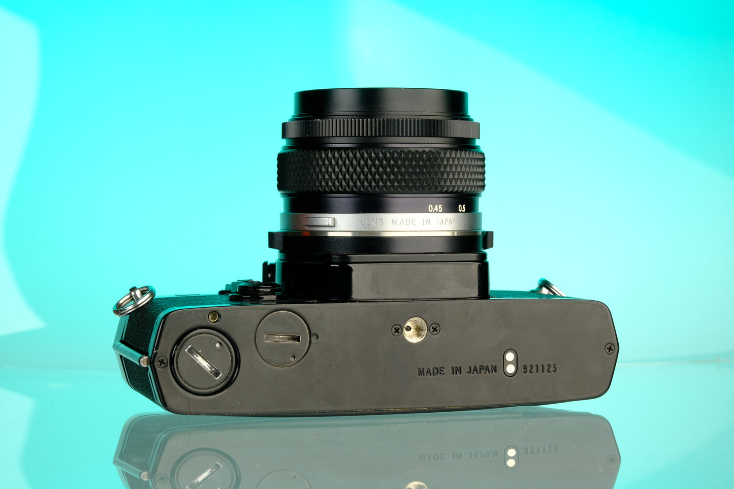 Olympus OM-1 35mm SLR Film Camera (Black) + 50mm f/1.4 Black Nose Lens