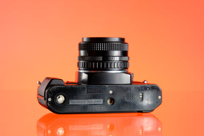 Nikon EM 35mm SLR + 60-200mm F/4-5.6