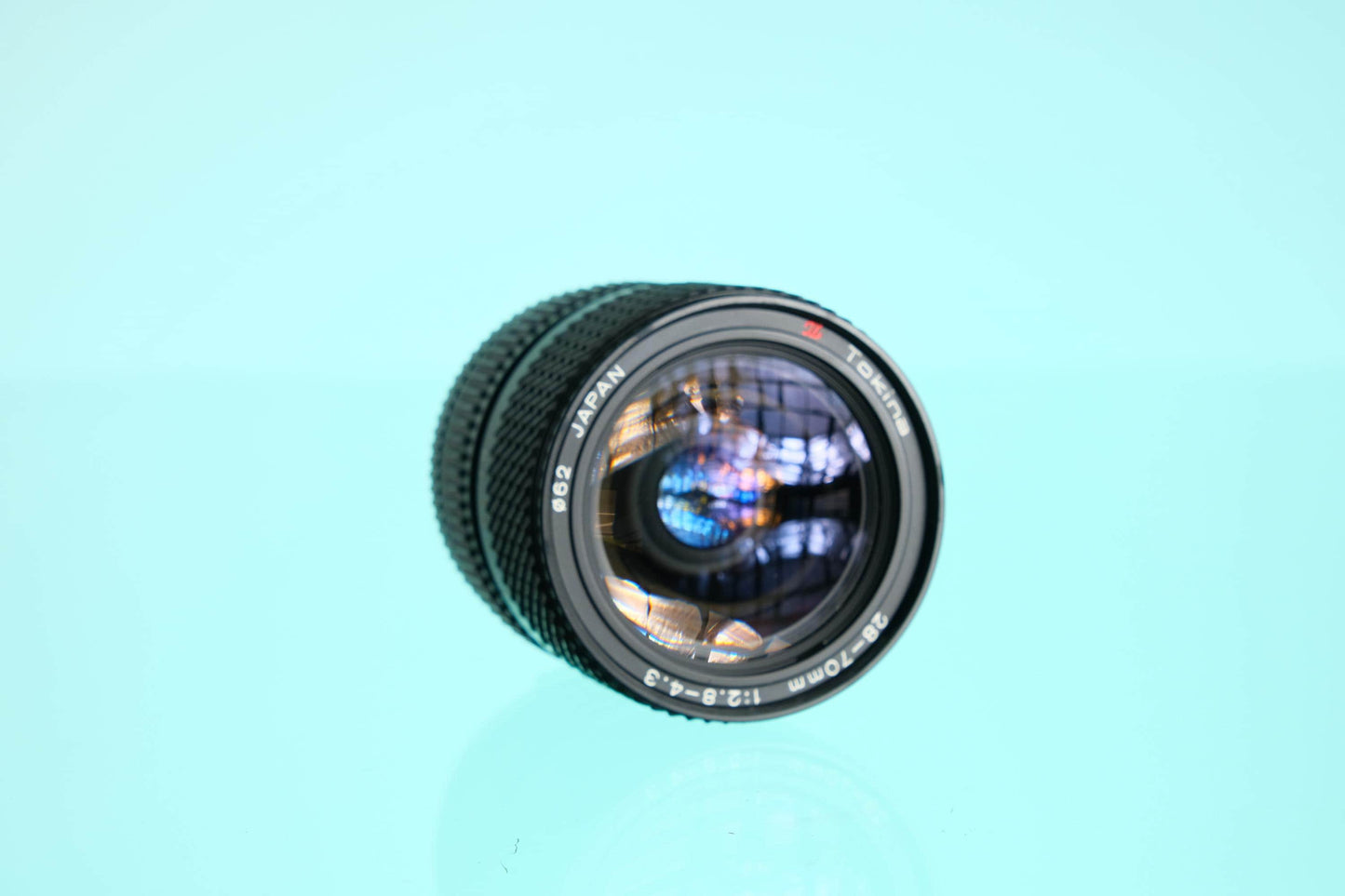 Tokina 28-70mm f/2.8-4.3 Zoom Lens Olympus OM Mount OM-10