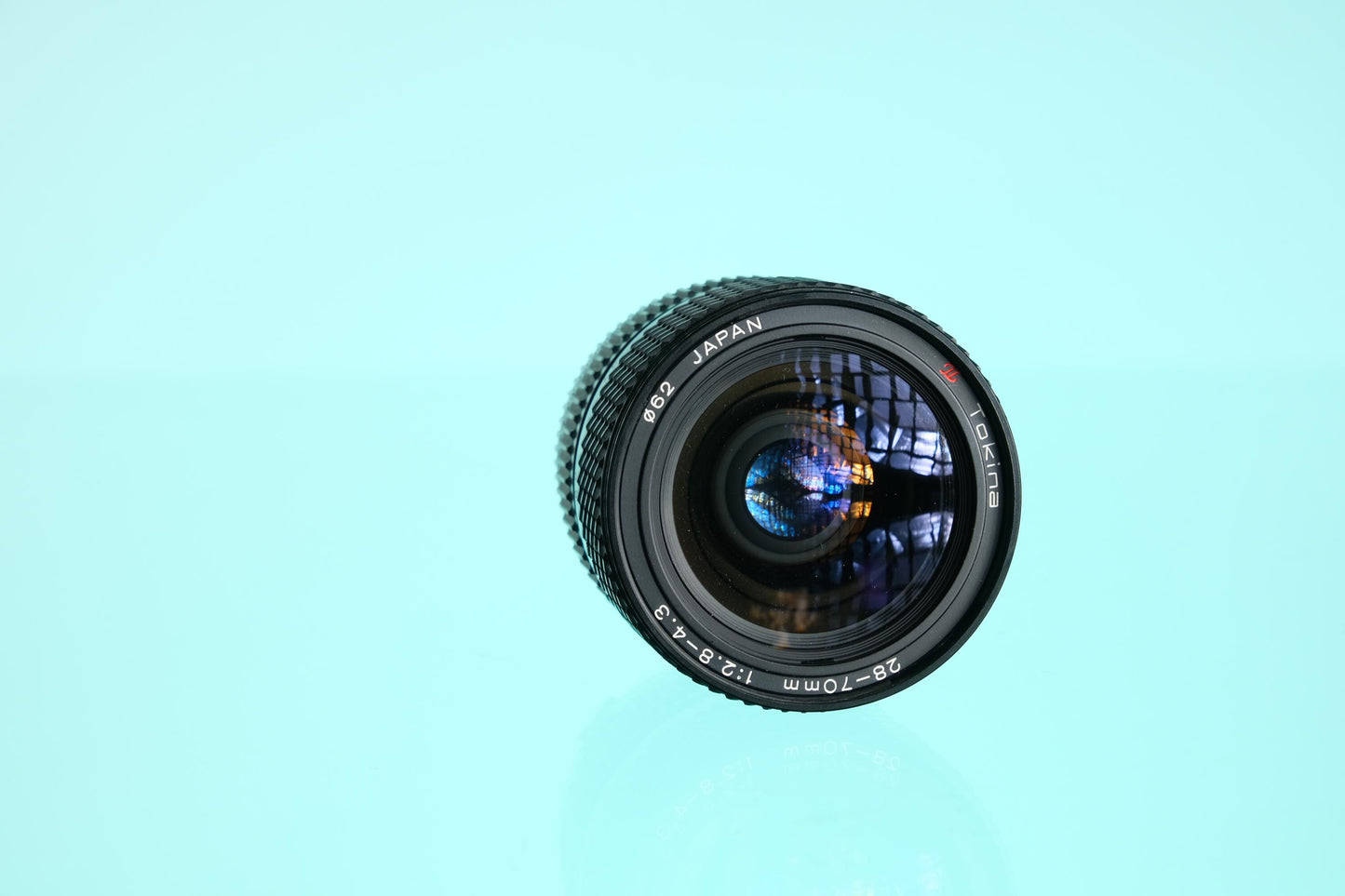 Tokina 28-70mm f/2.8-4.3 Zoom Lens Olympus OM Mount OM-10