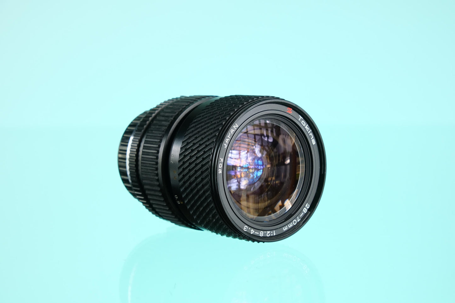 Tokina 28-70mm f/2.8-4.3 Zoom Lens Olympus OM Mount OM-10