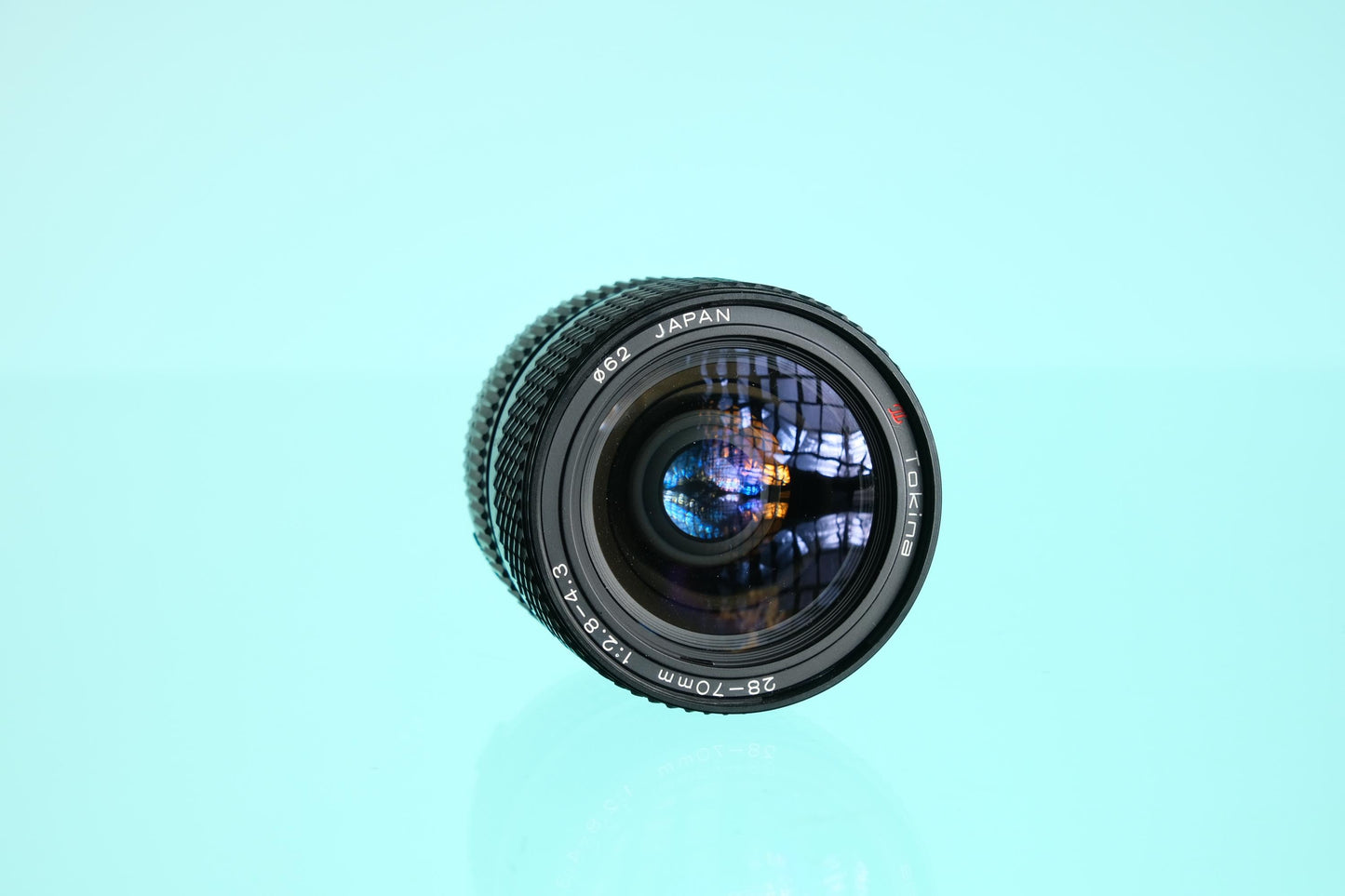 Tokina 28-70mm f/2.8-4.3 Zoom Lens Olympus OM Mount OM-10
