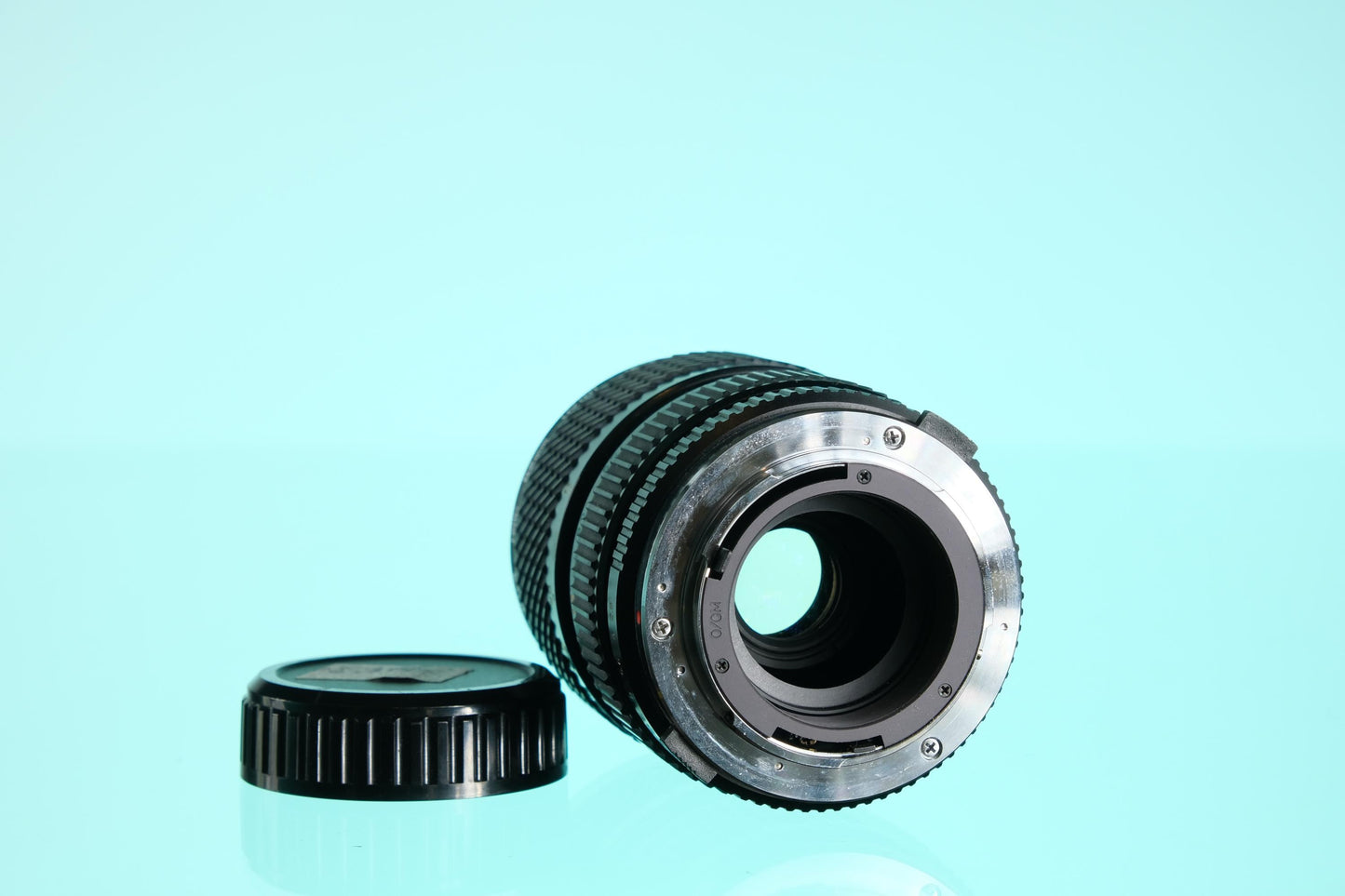 Tokina 28-70mm f/2.8-4.3 Zoom Lens Olympus OM Mount OM-10