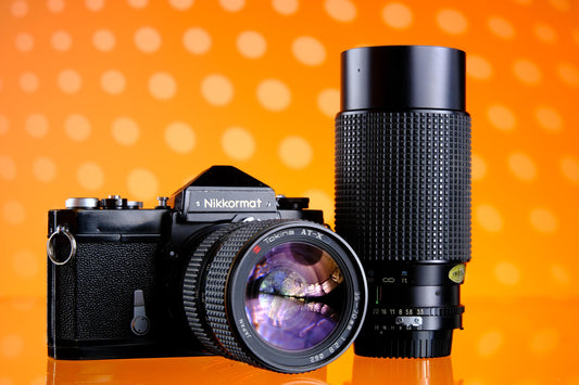 Nikkormat FTN Black 35mm SLR Starter Kit + 35-70mm f/2.8 Tokina ATX Zoom + 70-210mm Zoom Lenses