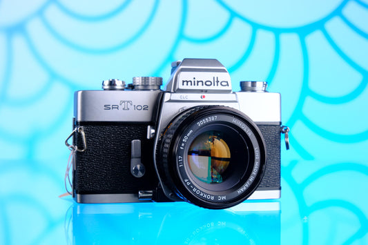 Minolta SRT 102 SLR 35mm Film Camera + Minolta Rokkor-PF 50mm f/1.7 Lens