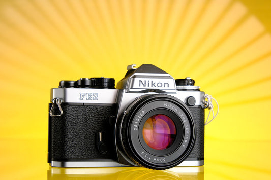 Nikon FE2 Silver 35mm SLR Film camera + 50mm F/1.8 Series E Lens Tested Working!