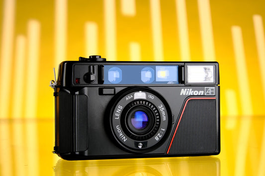 Nikon L35AF 35mm f/2.8 Point and Shoot 1st Version 1000 iso Tested Working!