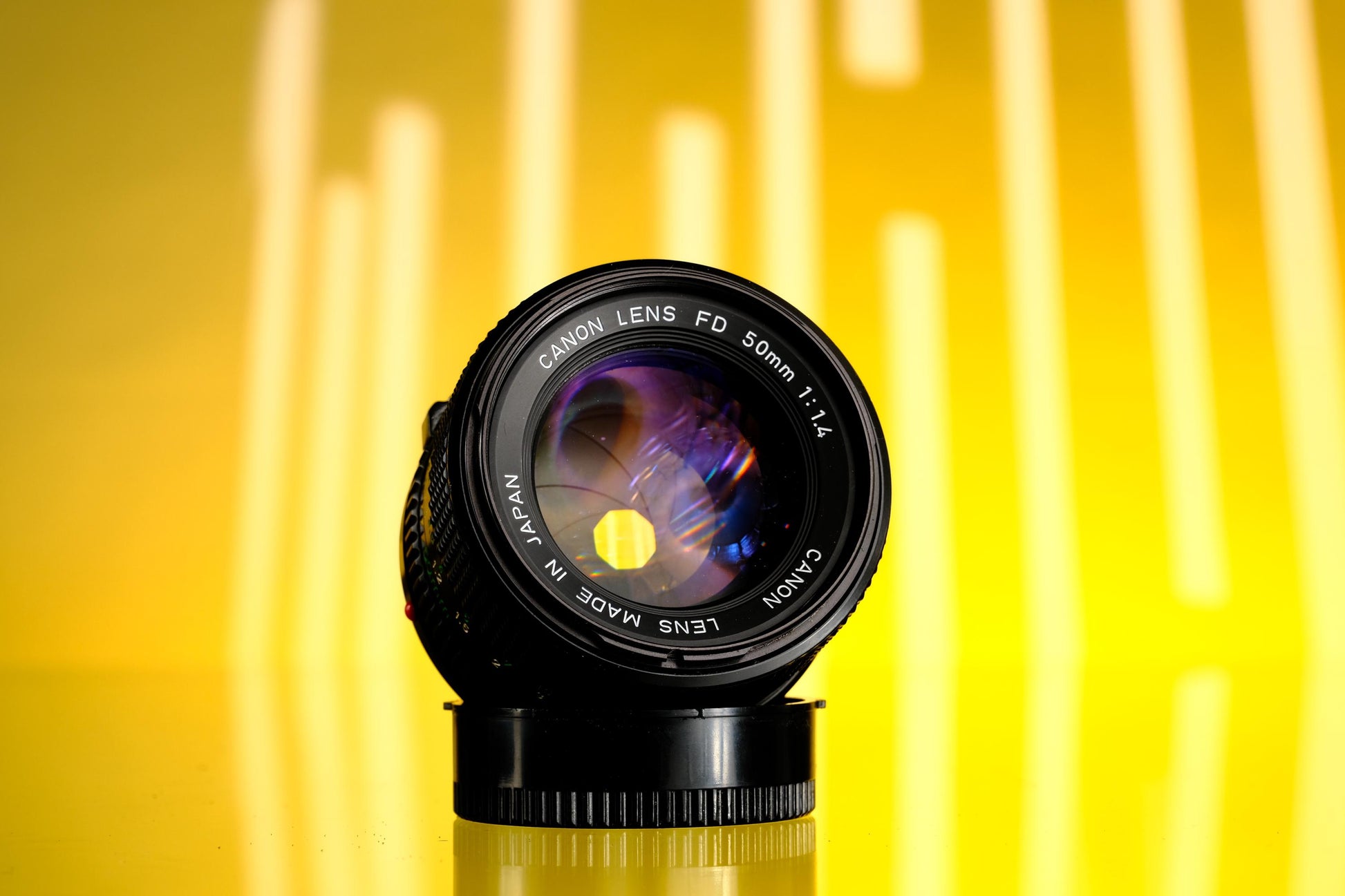 Canon 50mm F/1.4 nFD-Mount + 1980 Olympic Lens Cap