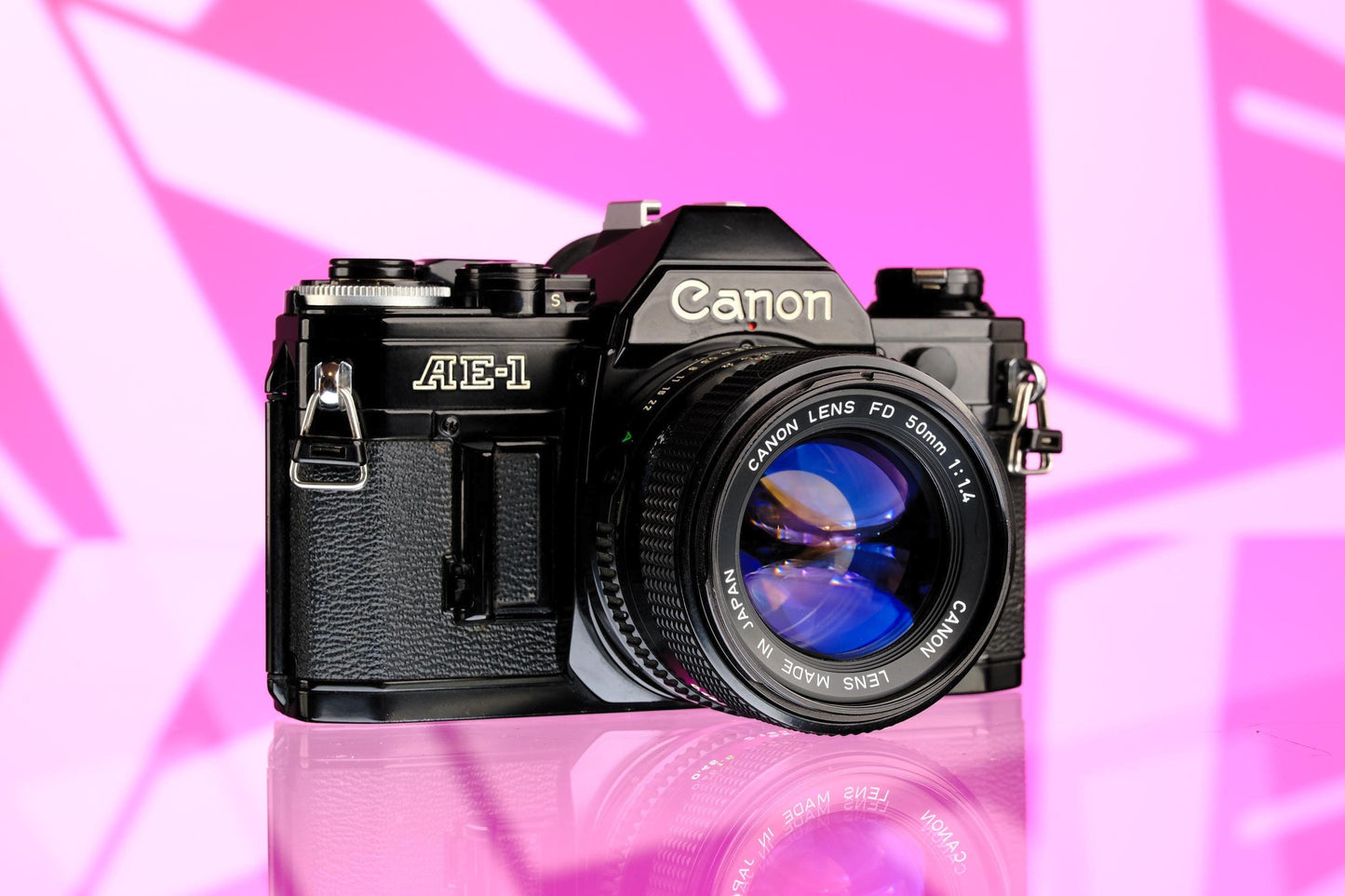 Canon Ae-1 Black 35mm SLR + 50mm f/1.4 nFD Lens