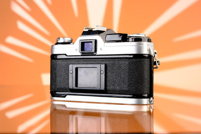 Canon AE-1 35mm SLR + 50mm f/1.8 Lens