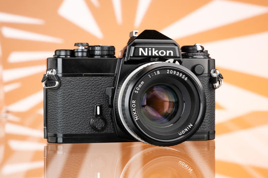 Nikon FE Black 35mm SLR + Nikon Nikkor 50mm f/1.8 Ai Lens
