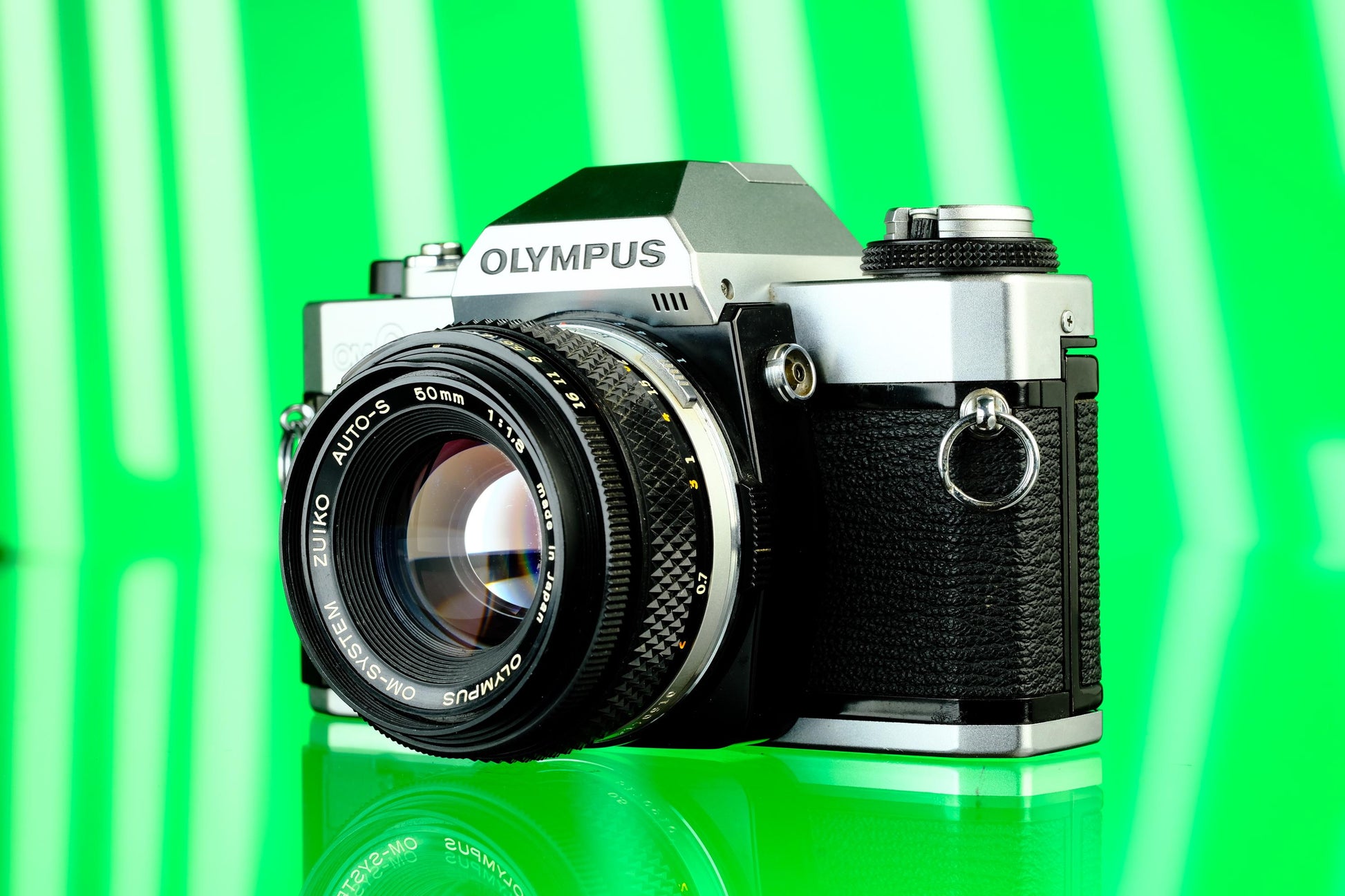 Olympus OMG 35mm SLR + 50mm f/1.8 Lens