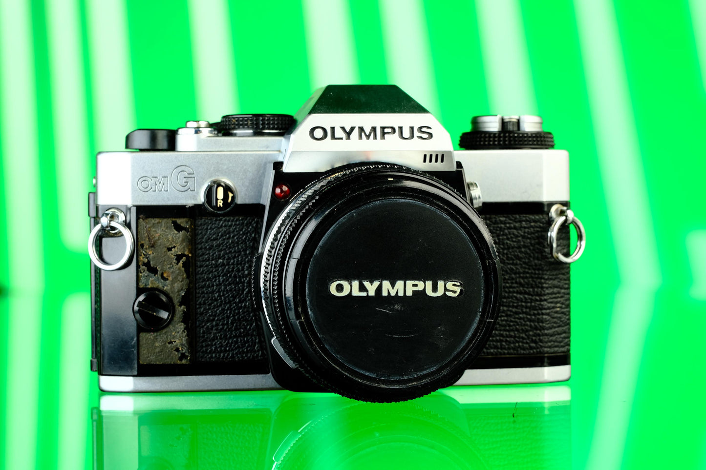Olympus OMG 35mm SLR + 50mm f/1.8 Lens