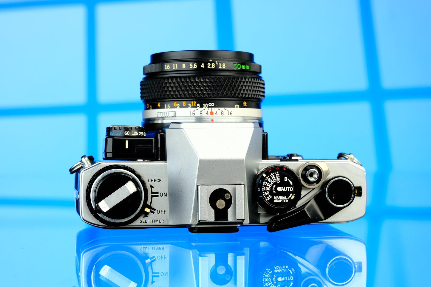 Olympus OM-10 35mm SLR + 50mm f/1.8 Zuiko MC Lens