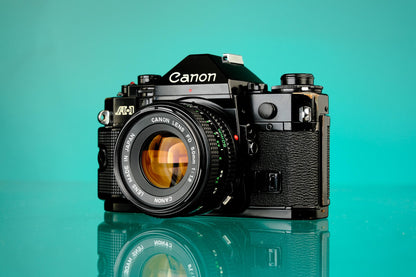 Canon A-1 35mm SLR Film Camera + Canon 50mm f/1.8 FD Lens
