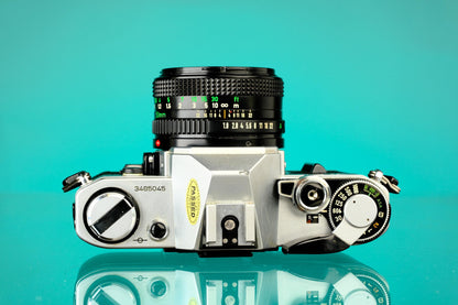 Canon AE-1 35mm SLR Film Camera + Canon 50mm f/1.8 FD Lens