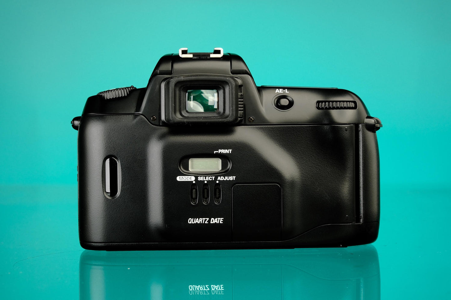 Nikon N60 35mm Autofocus SLR + 28-80mm f/3.5-5.6 Quantaray Zoom Lens