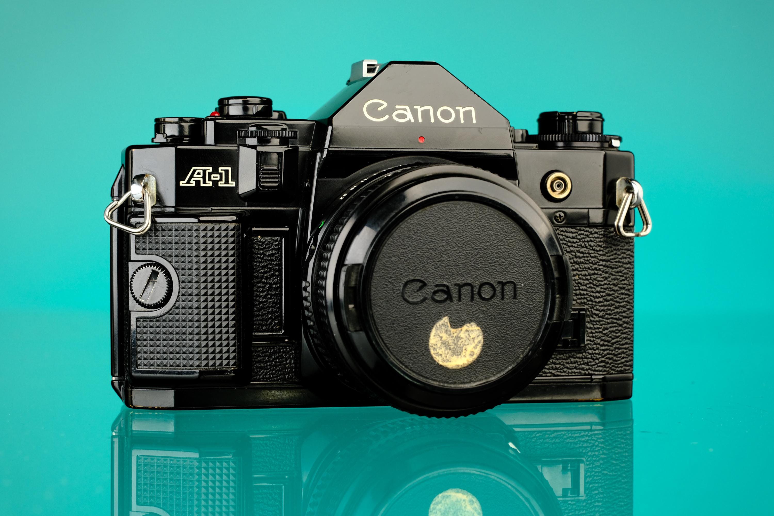Canon 50mm FD A-1 with Camera f⁄1.8 SLR 35mm Film Lens AE-1 + f1.8