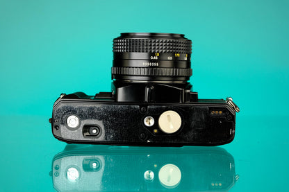 Minolta X570 35mm SLR + 50mm f/1.7 Lens