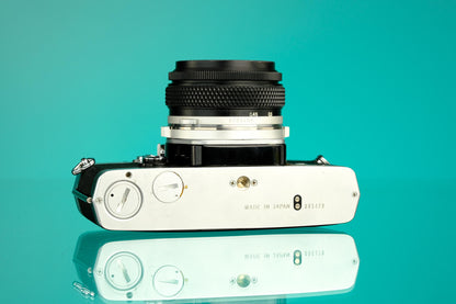 Olympus OM-1 35mm SLR + 50mm f/1.8 Lens