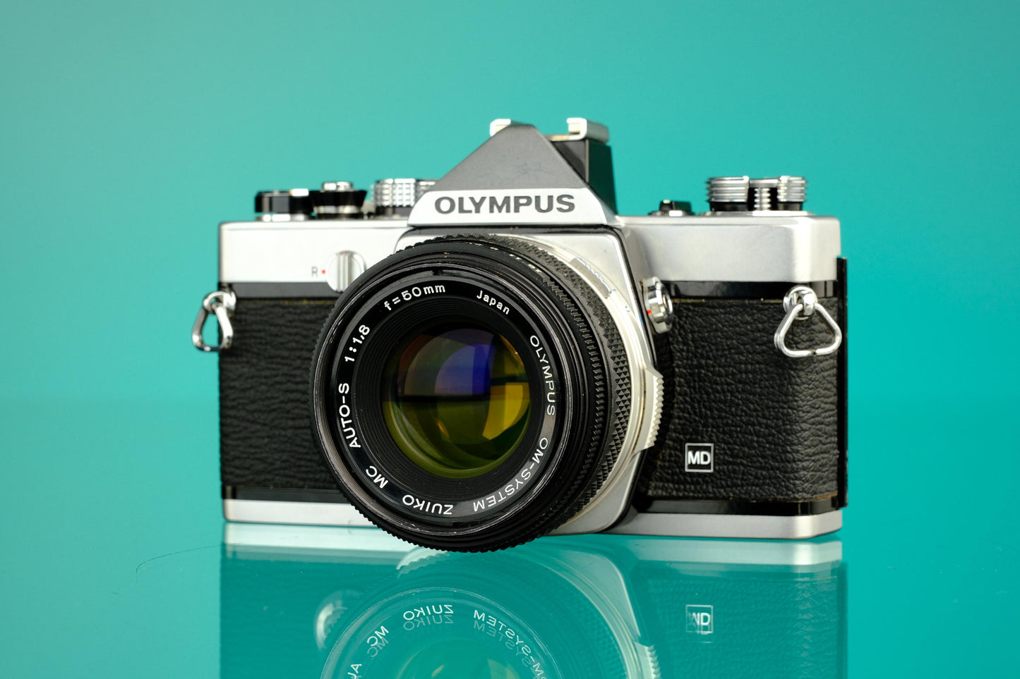 Olympus OM-1 35mm SLR + 50mm f/1.8 Lens