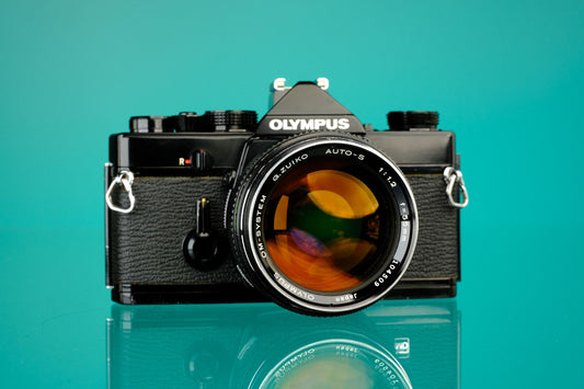 Olympus OM-1 Black 35mm SLR + 55mm f/1.2 Lens