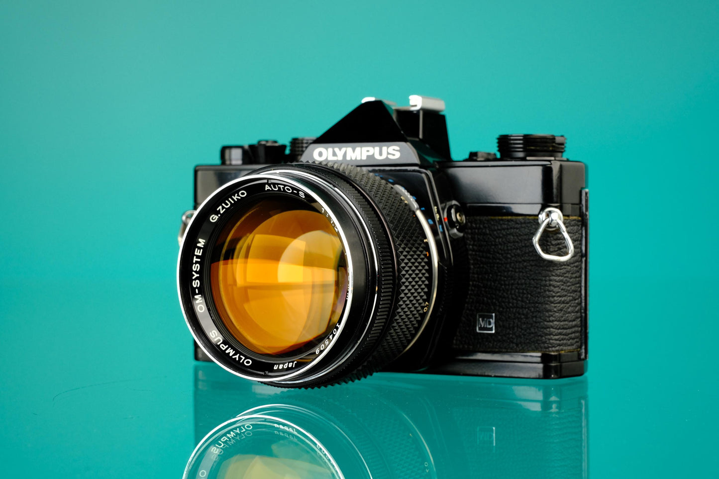 Olympus OM-1 Black 35mm SLR + 55mm f/1.2 Lens