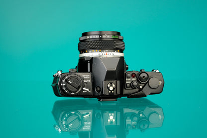 Olympus OM-4T 35mm SLR (Black) + 50mm f/1.8 Zuiko Lens