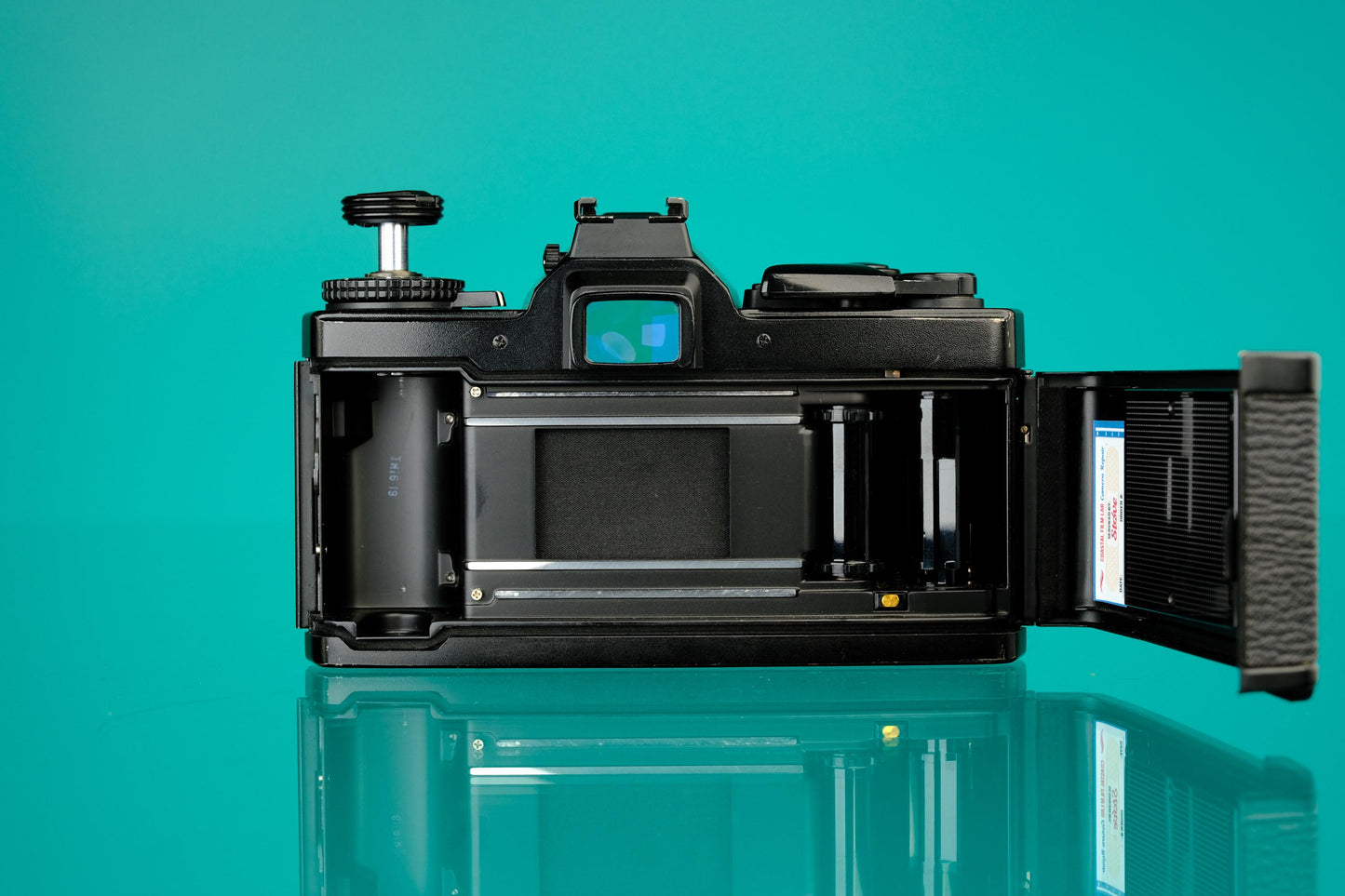 Olympus OM-4T 35mm SLR (Black) + 50mm f/1.8 Zuiko Lens