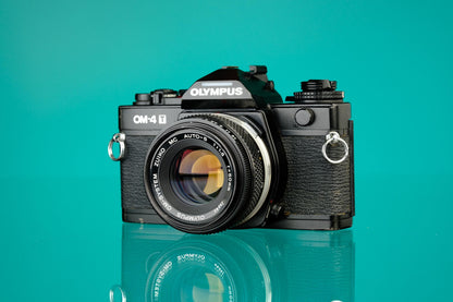 Olympus OM-4T 35mm SLR (Black) + 50mm f/1.8 Zuiko Lens
