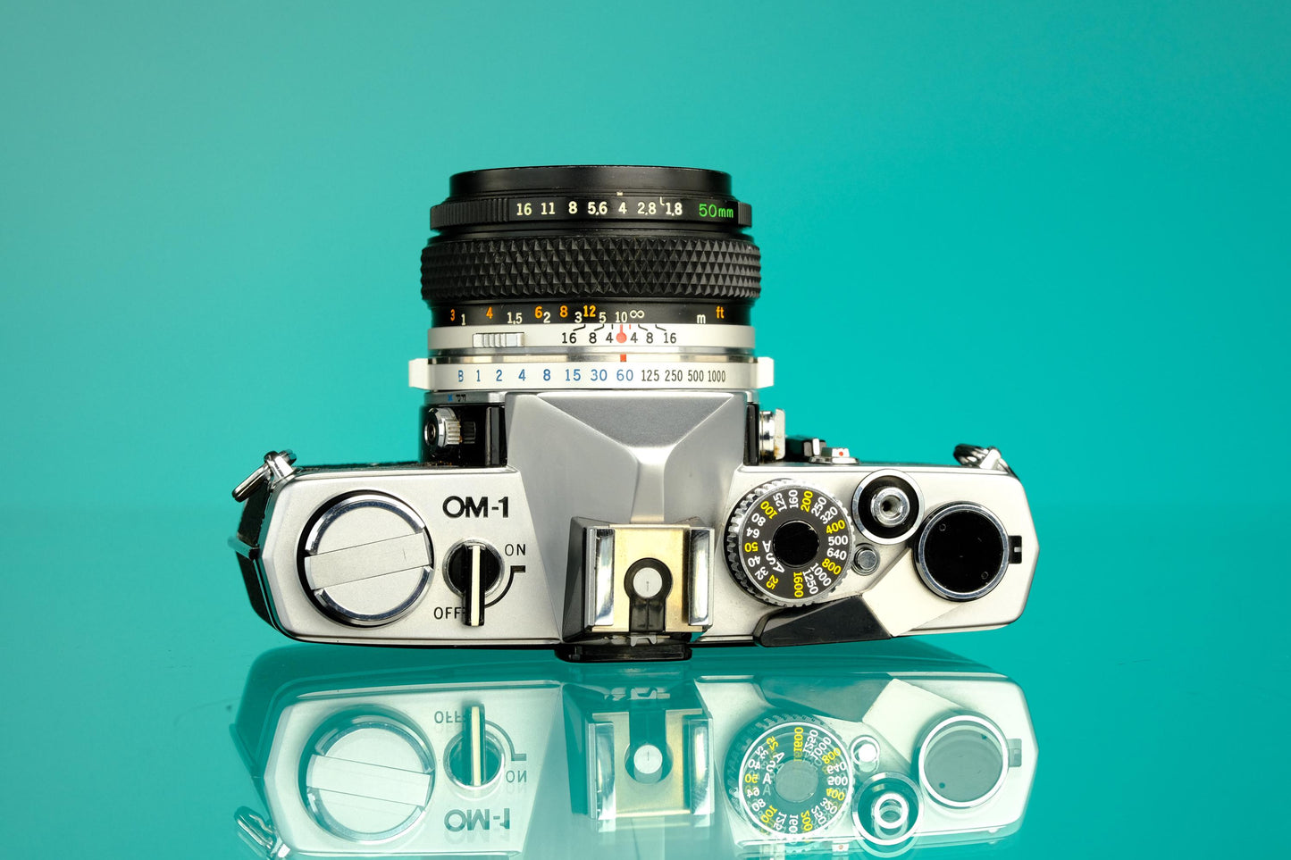 Olympus OM-1 35mm SLR + 50mm f/1.8 Lens