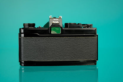 Olympus OM-1 Black 35mm SLR + 55mm f/1.2 Lens